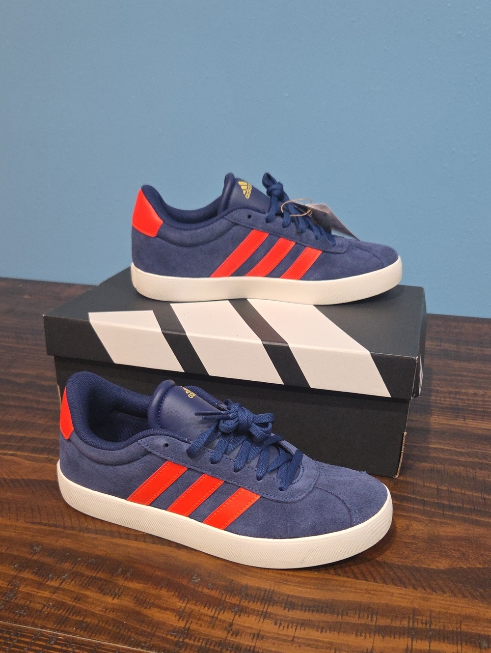 Adidas Big Kids Navy Sneakers with Bright Orange Stripes